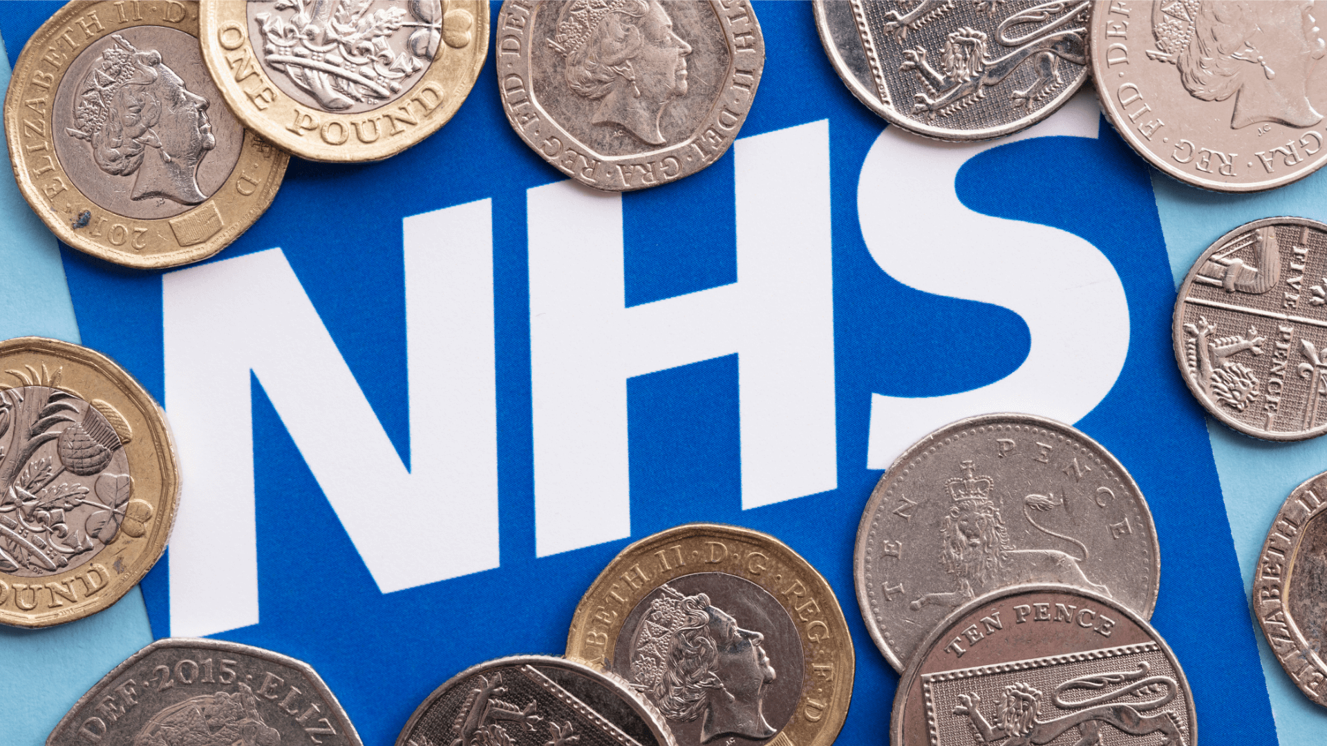 Image of NHS sign and coins around it
