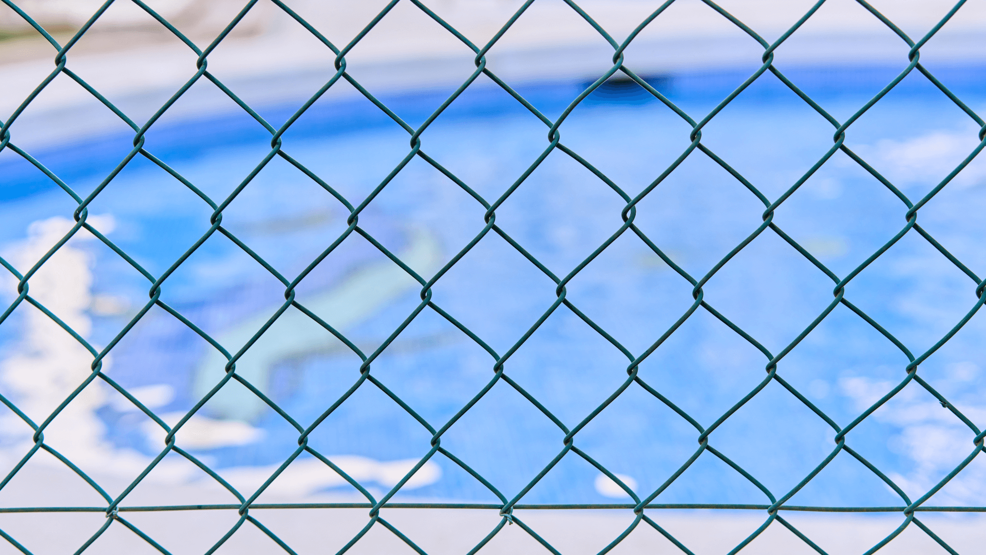 Swimming pool behind a fence